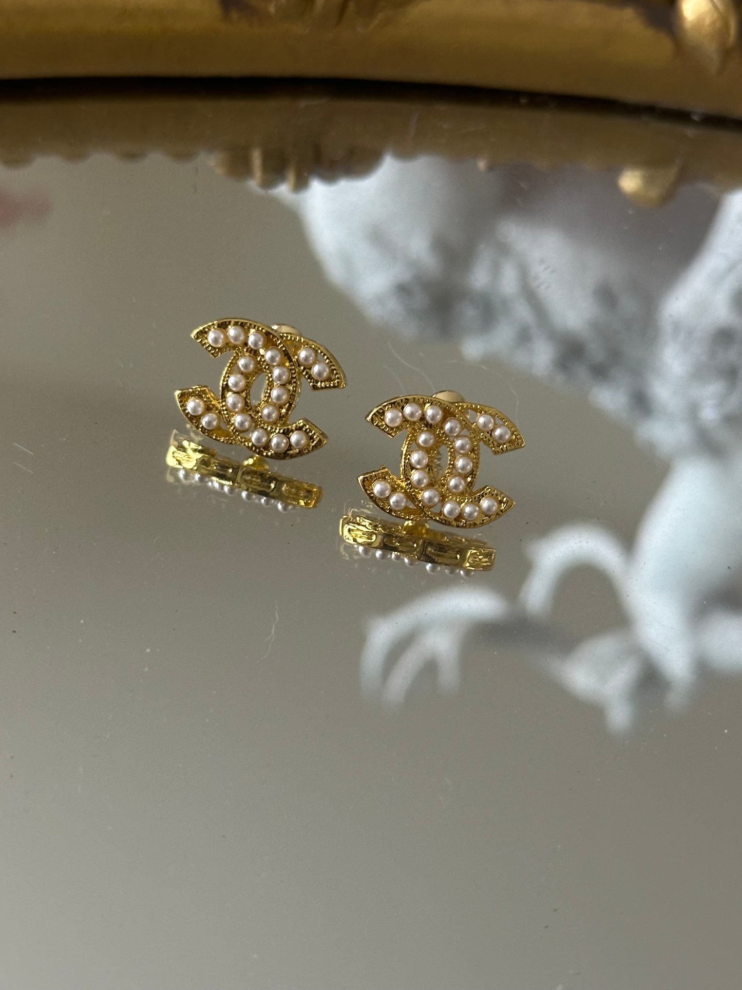 Gold pearl earrings