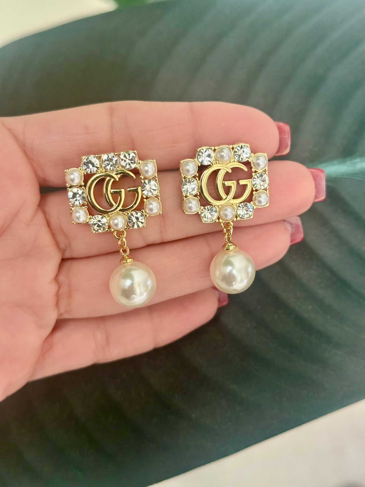 Pearl Dangling earrings with stone