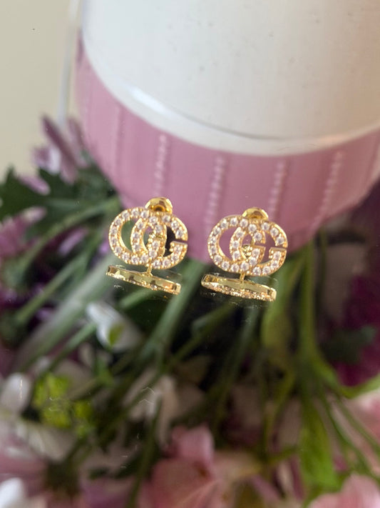 Gold studs with stone