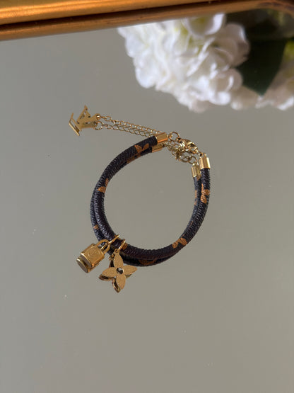 Leather bracelet with charms