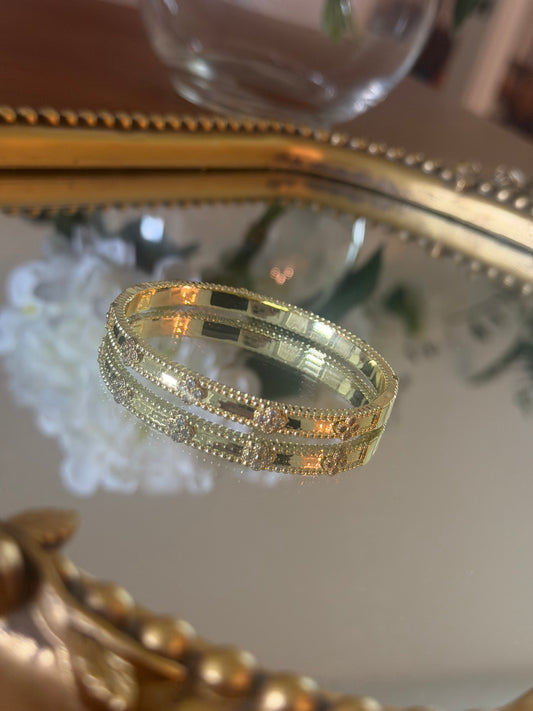 Gold bracelet with stone