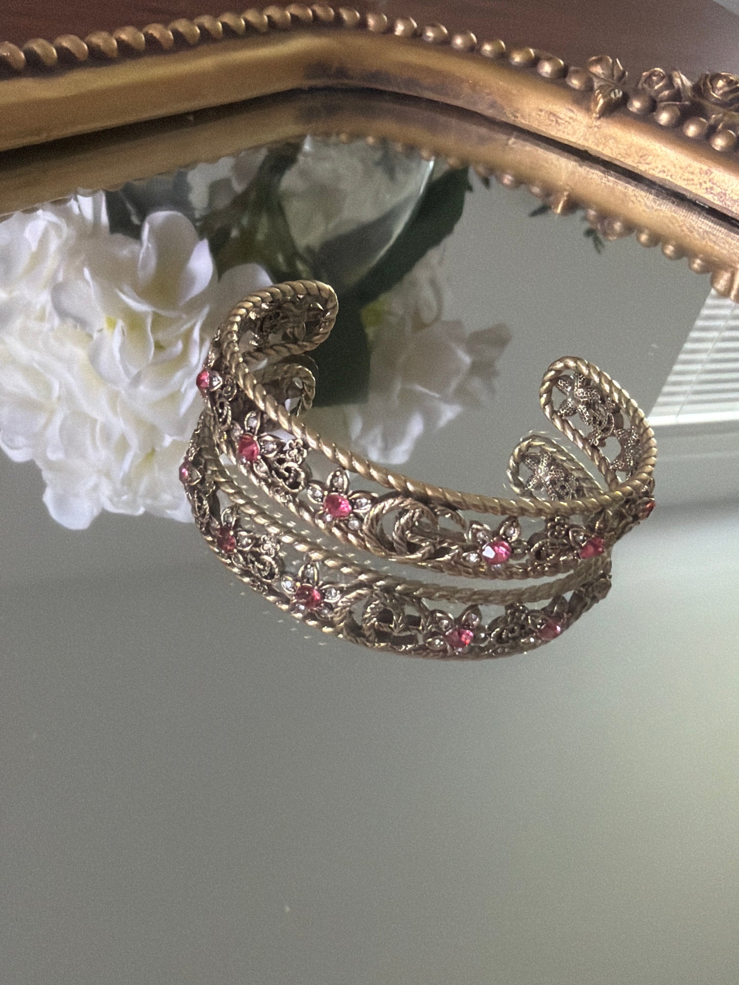 Old gold cuff bracelet with pink stone
