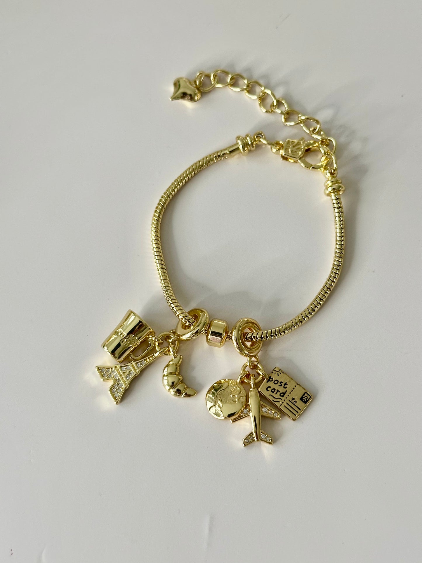 Adjustable travel charm bracelet