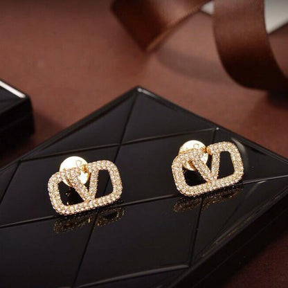Gold Studs with stone