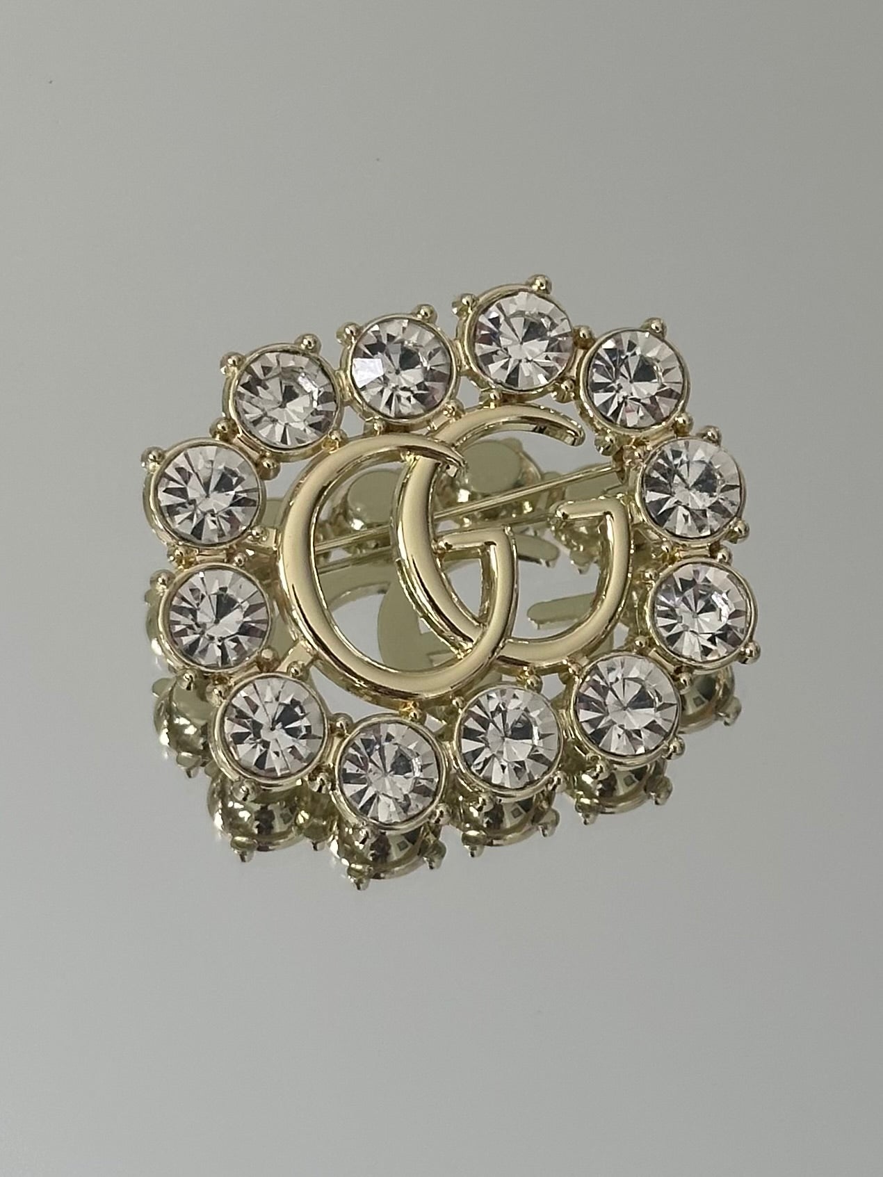 Gold Brooch with  stone