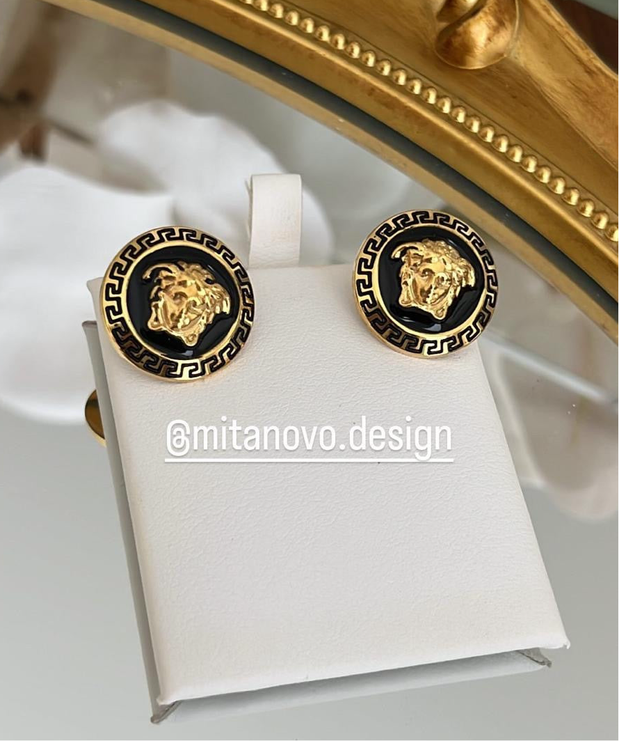 Gold and black earrings