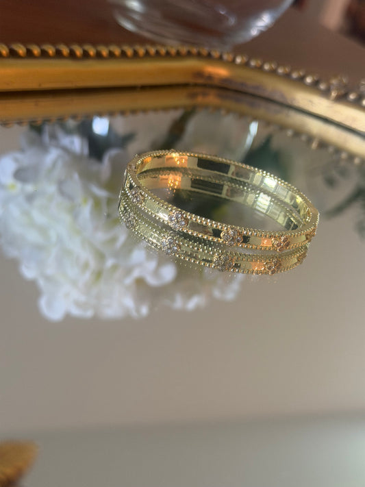 Gold bracelet with stone