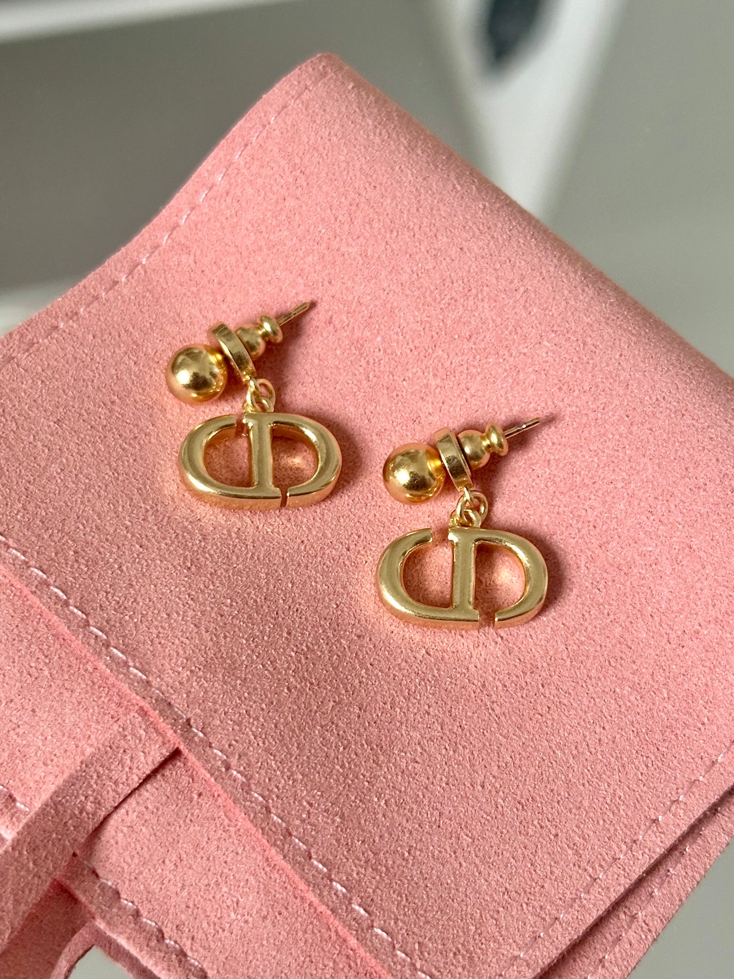 Gold dangling earrings
