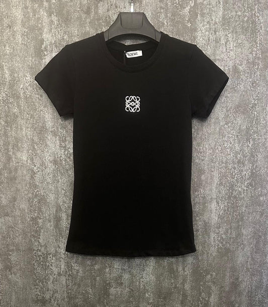 Black t-shirt with a white logo on a textured gray background